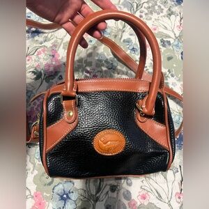 Carina int’l Inc all weather leather purse